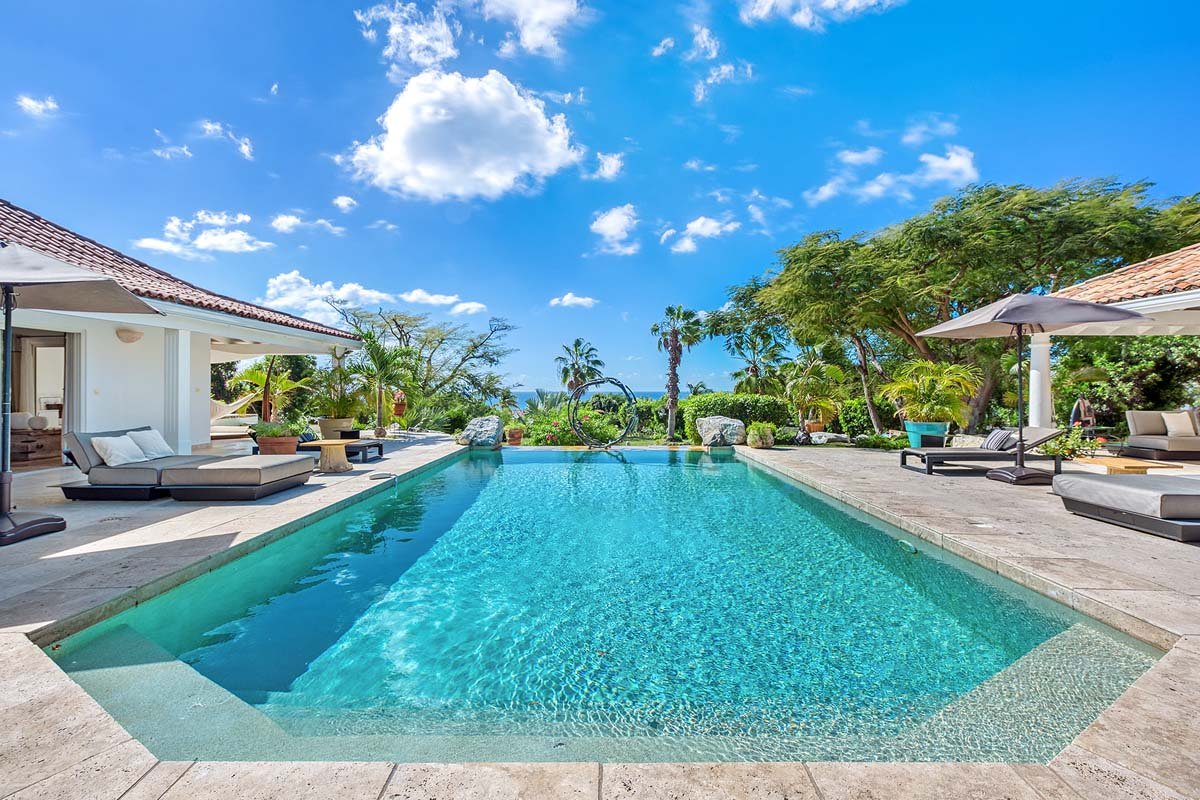 Private pool with terrace and tropical landscaping at La Pinta, St. Maarten