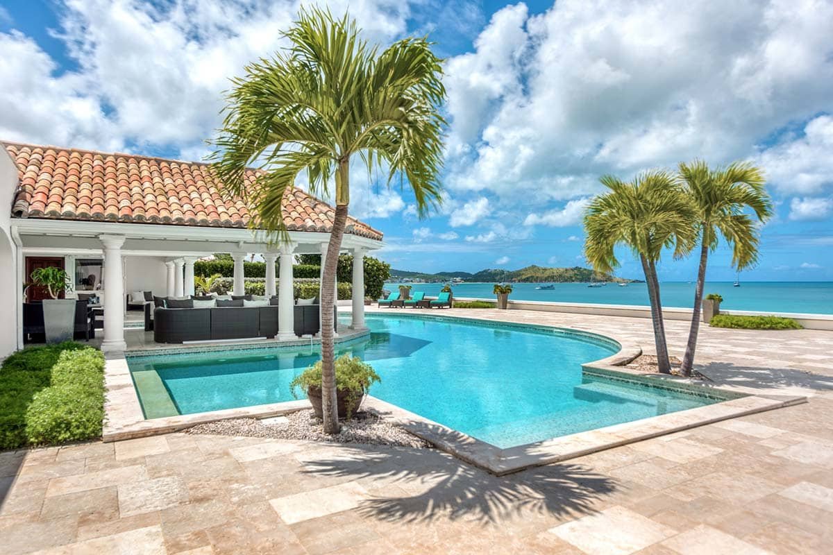 Villa Petite Plage 4 pool, Grand Case, St. Martin – horseshoe-shaped heated pool with ocean view