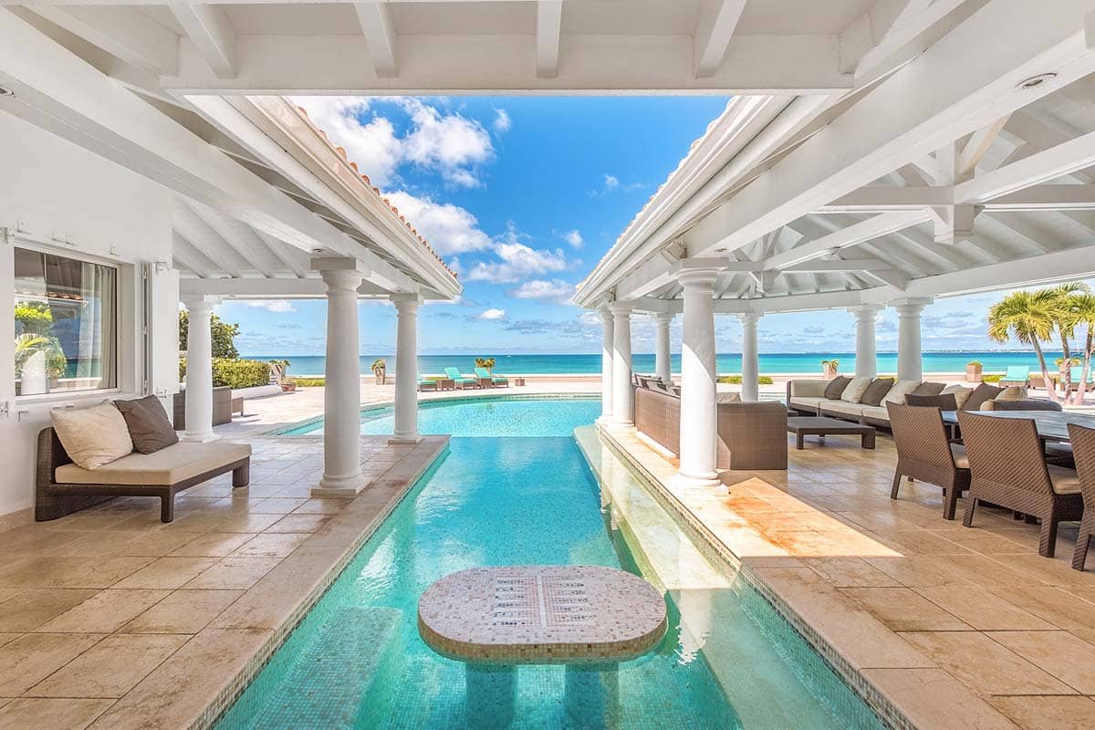 Villa Petite Plage 4 poolside seating, Grand Case, St. Martin – shaded lounge area with ocean view
