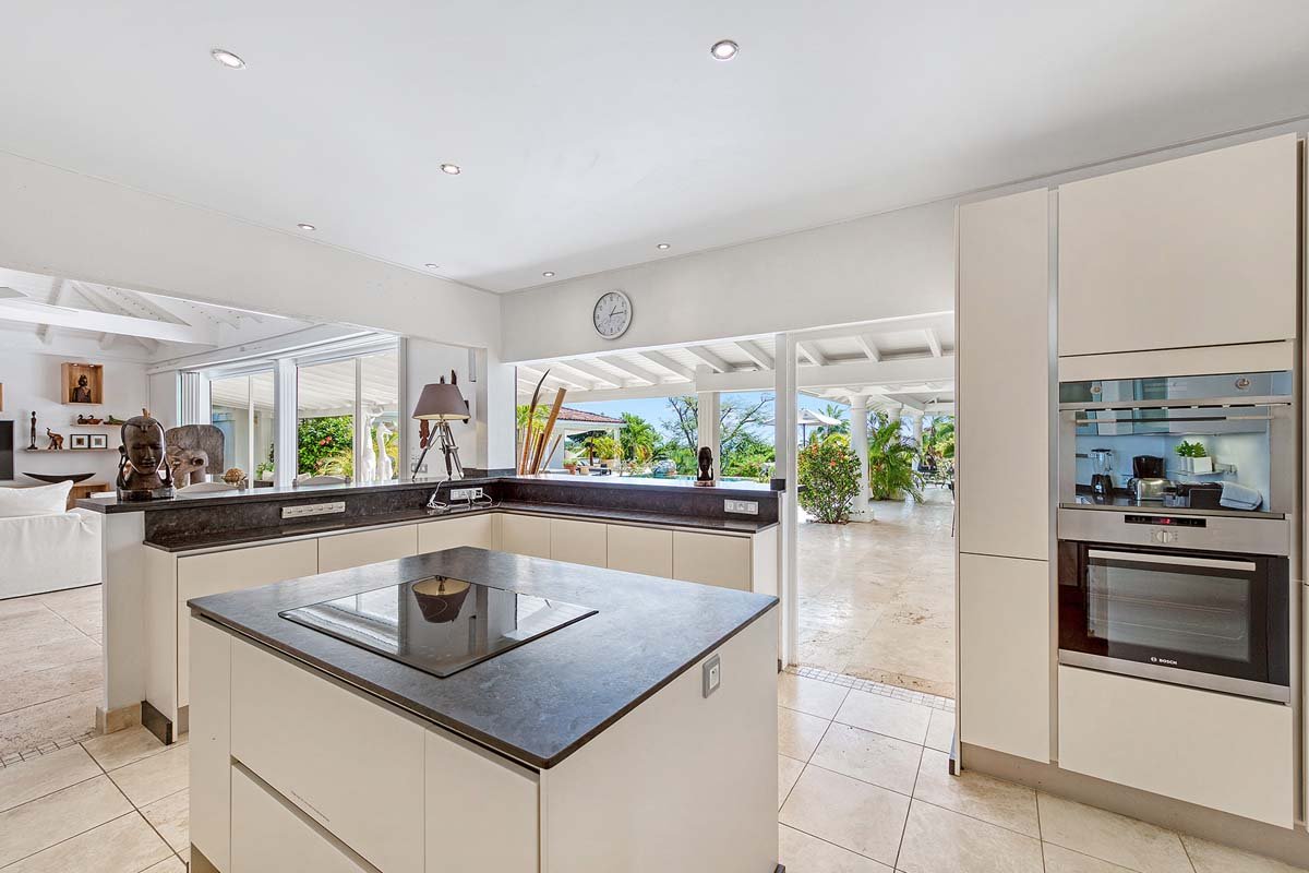 Modern, open kitchen interior at La Pinta villa, St. Maarten with island vantage