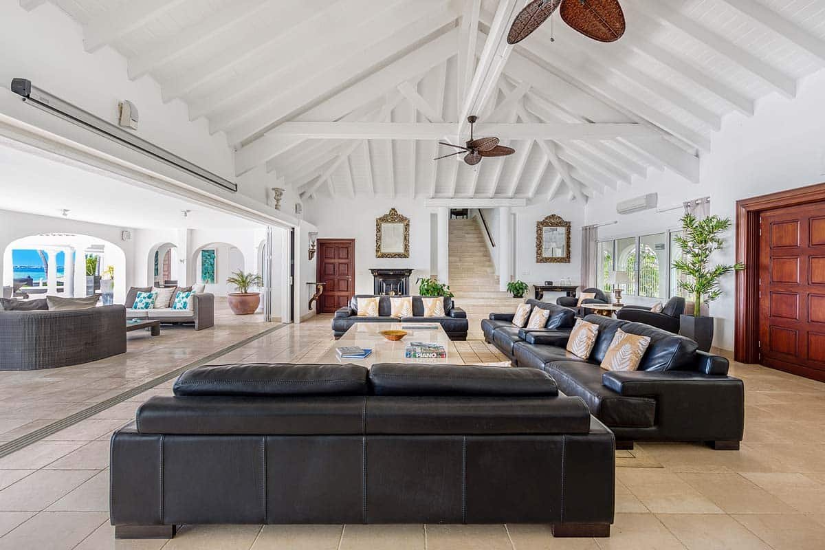 Villa Petite Plage 4 living room, Grand Case, St. Martin – open-plan lounge with ocean view and media area