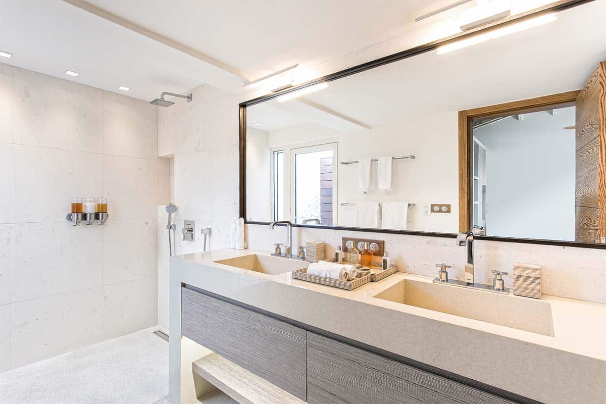 Villa Avanti St. Martin modern bathroom with double vanity and rain shower.