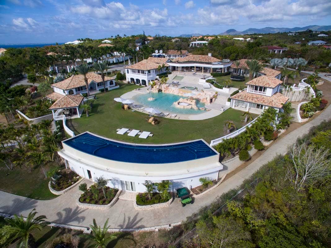 Aerial view of Sandyline Estate in Terres Basses, St. Martin, showcasing the expansive villa layout and surrounding tropical landscape