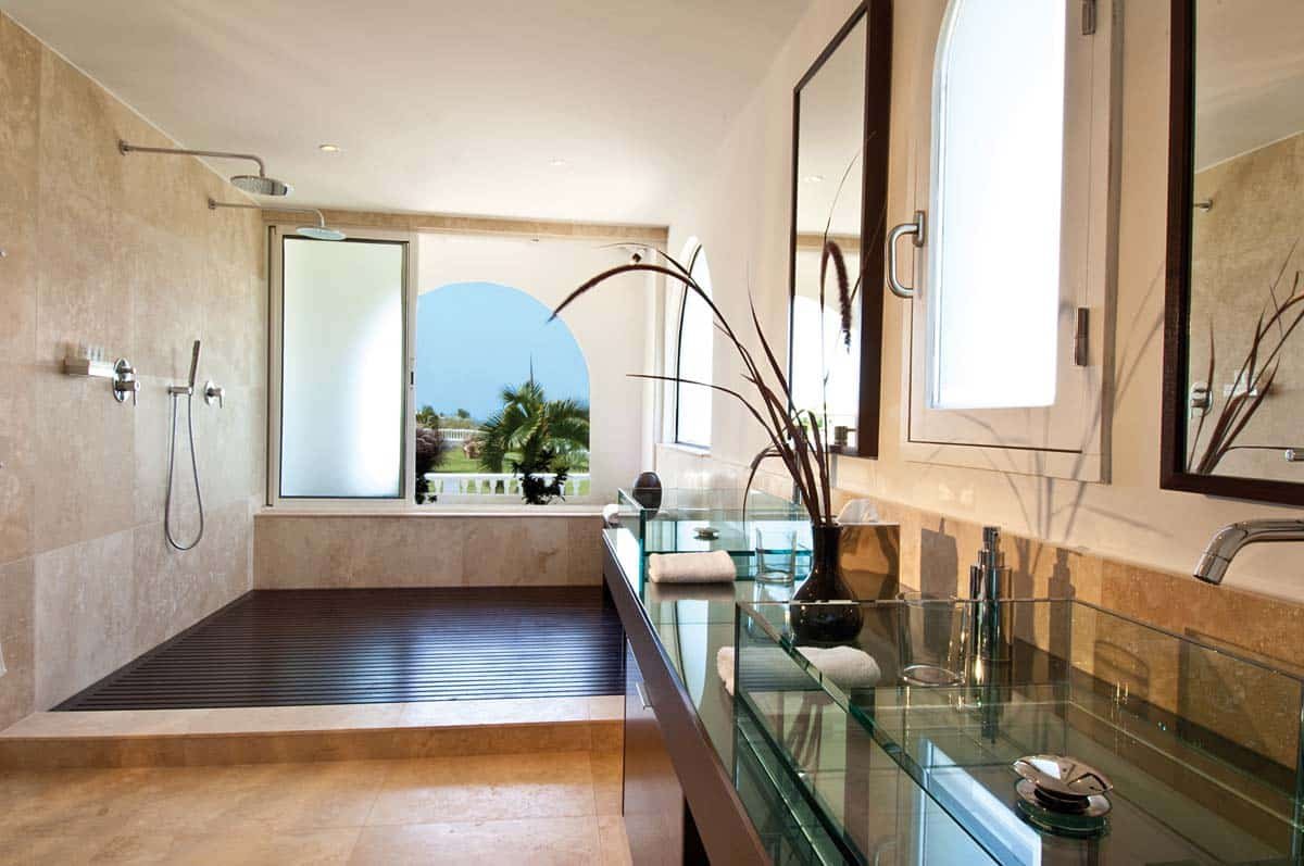 Elegant bathroom at Sandyline Estate, Terres Basses, St. Martin, featuring a freestanding tub with ocean views