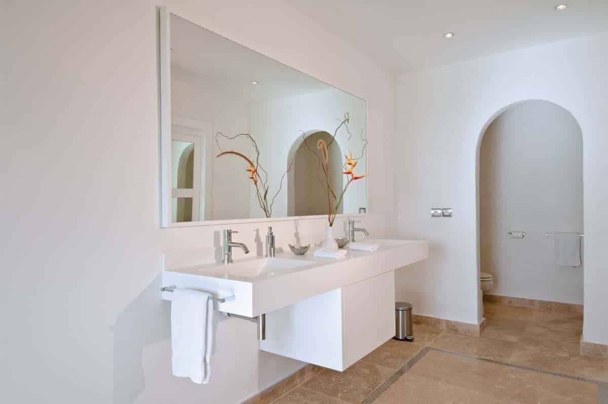 Luxurious bathroom at Sandyline Estate, Terres Basses, St. Martin, featuring a freestanding tub with ocean views