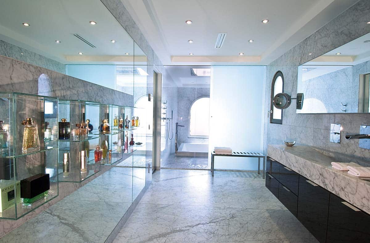 Master bathroom with double vanity, soaking tub, and walk-in shower at Villa Sandyline, Terres Basses, St. Martin