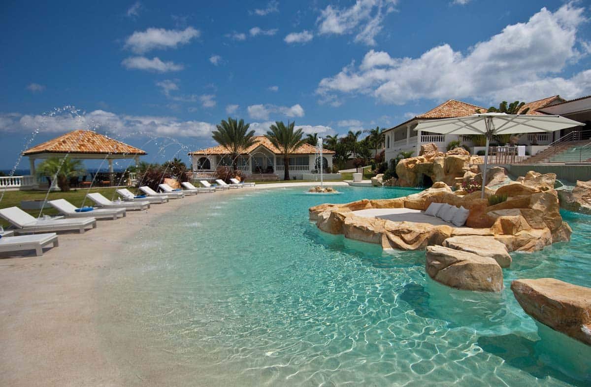 Infinity-edge pool with ocean view at Villa Sandyline, Terres Basses, St. Martin