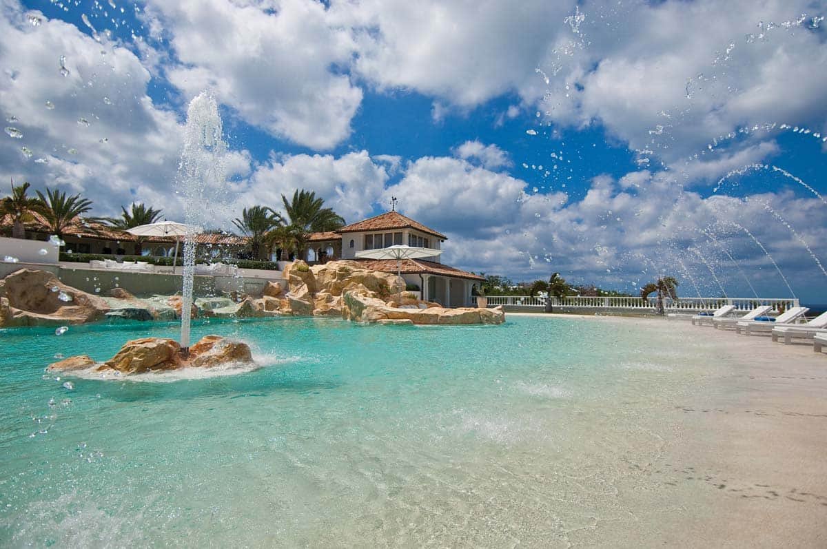 Villa Sandyline: Luxury 7-bedroom estate with pools, tennis court, and lush gardens in Terres Basses, St. Martin