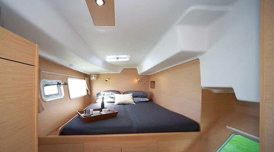 Master bedroom aboard 38-ft luxury catamaran with panoramic sea views, charter vessel in St. Maarten