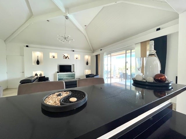Sleek kitchen with granite countertops and modern appliances at Villa Paloma, Orient Bay, St. Martin.