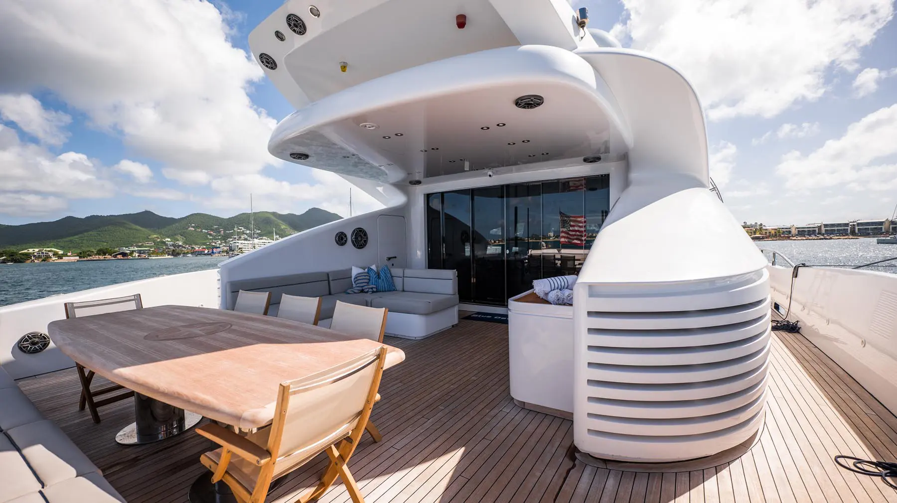 Luxury yacht interior with plush seating and panoramic windows in St. Maarten