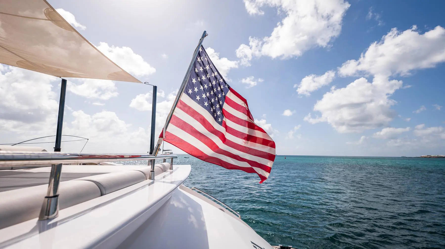 Luxury yacht interior featuring a spacious lounge with panoramic windows in St. Maarten