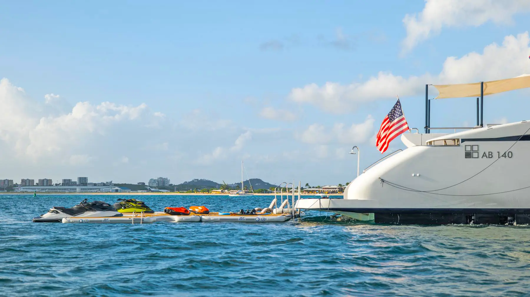 Mega-yacht BlueDevil rear swim platform and water toys off St. Maarten