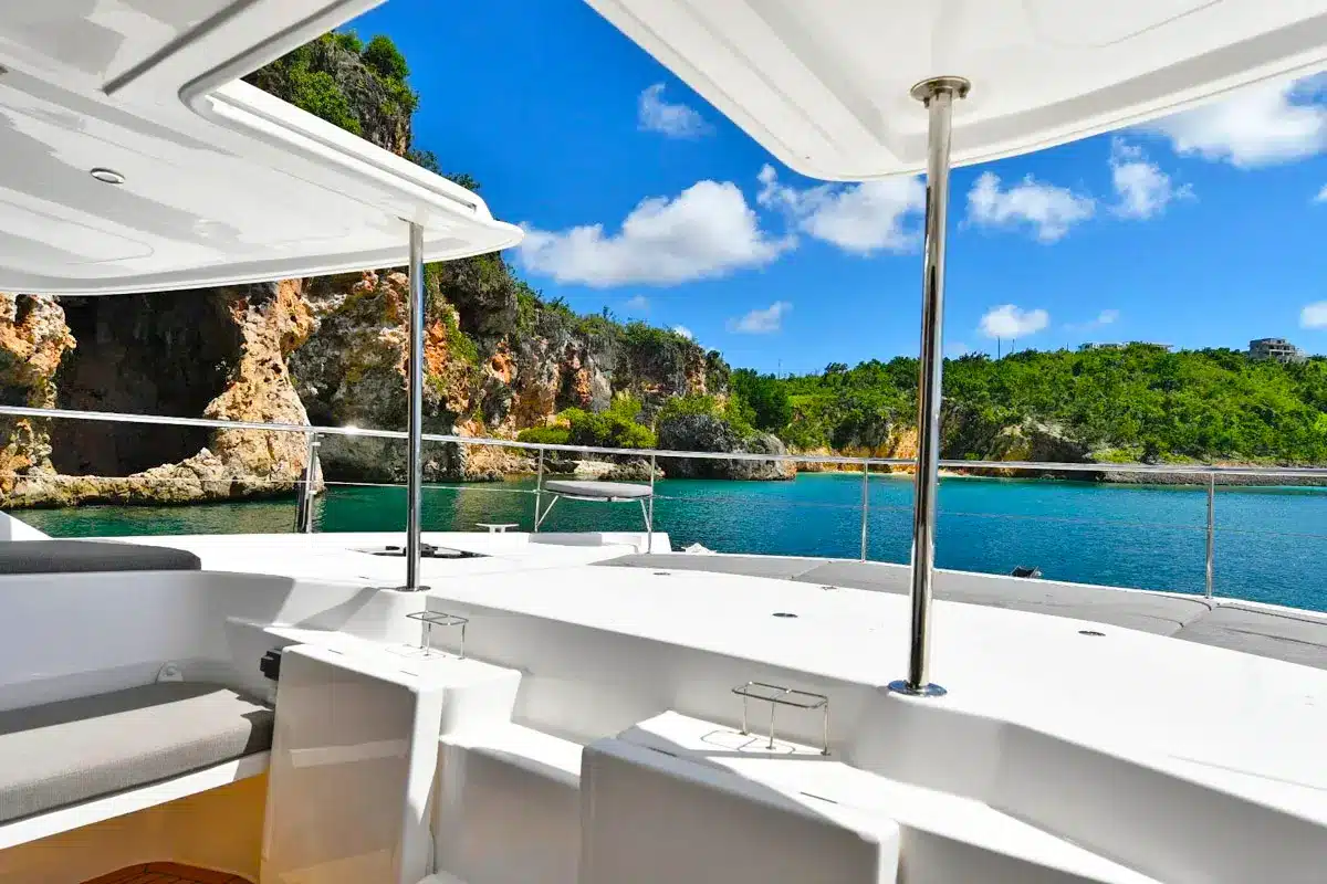 Vogue 51ft catamaran indoor lounge with plush seating and A/C in St. Maarten