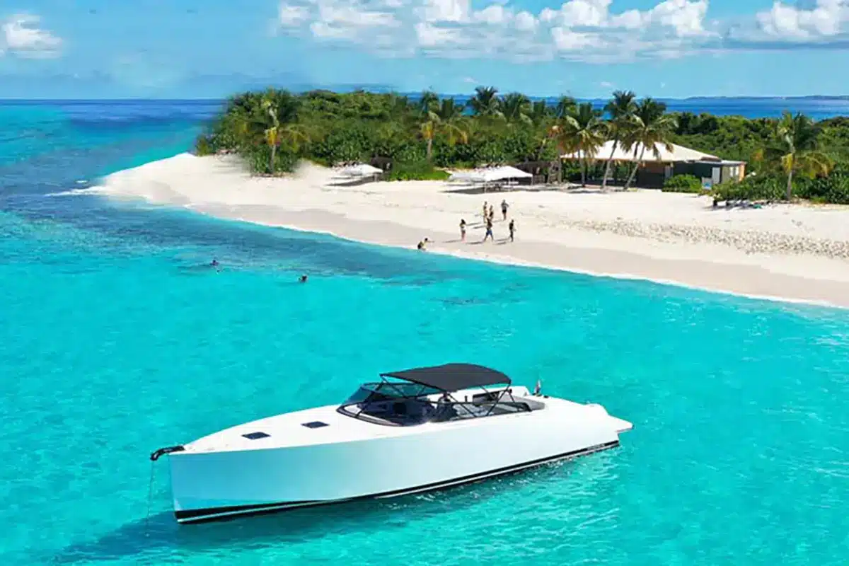 VanDutch 55 yacht cruising near Anguilla's coastline, showcasing its sleek design and luxury features