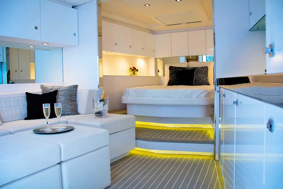 VanDutch 55 yacht cruising near St. Maarten's coastline, showcasing its sleek design and luxury features