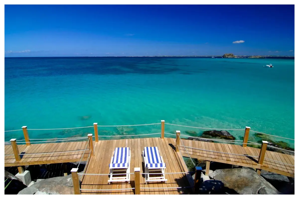 Ocean view from Grand Case Beach Club overlooking Creole Rock and distant Anguilla, St. Martin