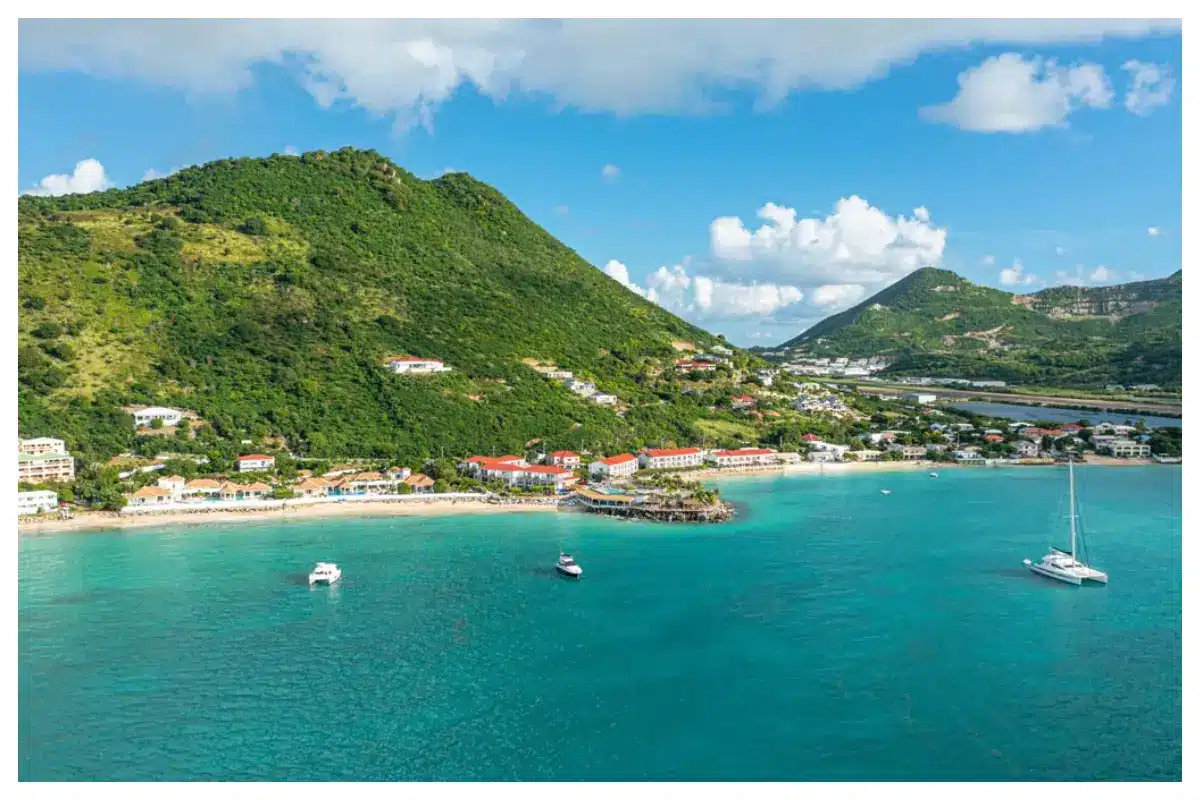 Aerial ocean view of Grand Case Beach Club, Little Bay, and Grand Case Beach in St. Martin