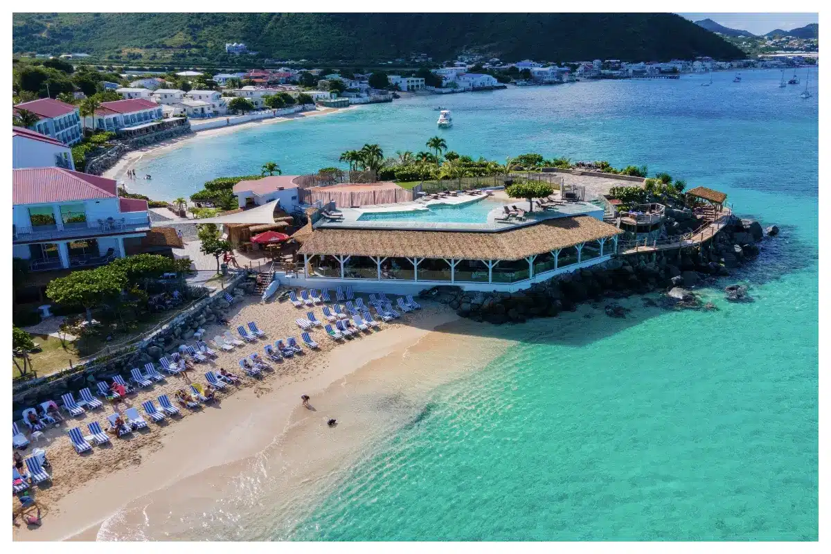 Aerial view of Grand Case Beach Club, St. Martin showing beachfront and turquoise bay
