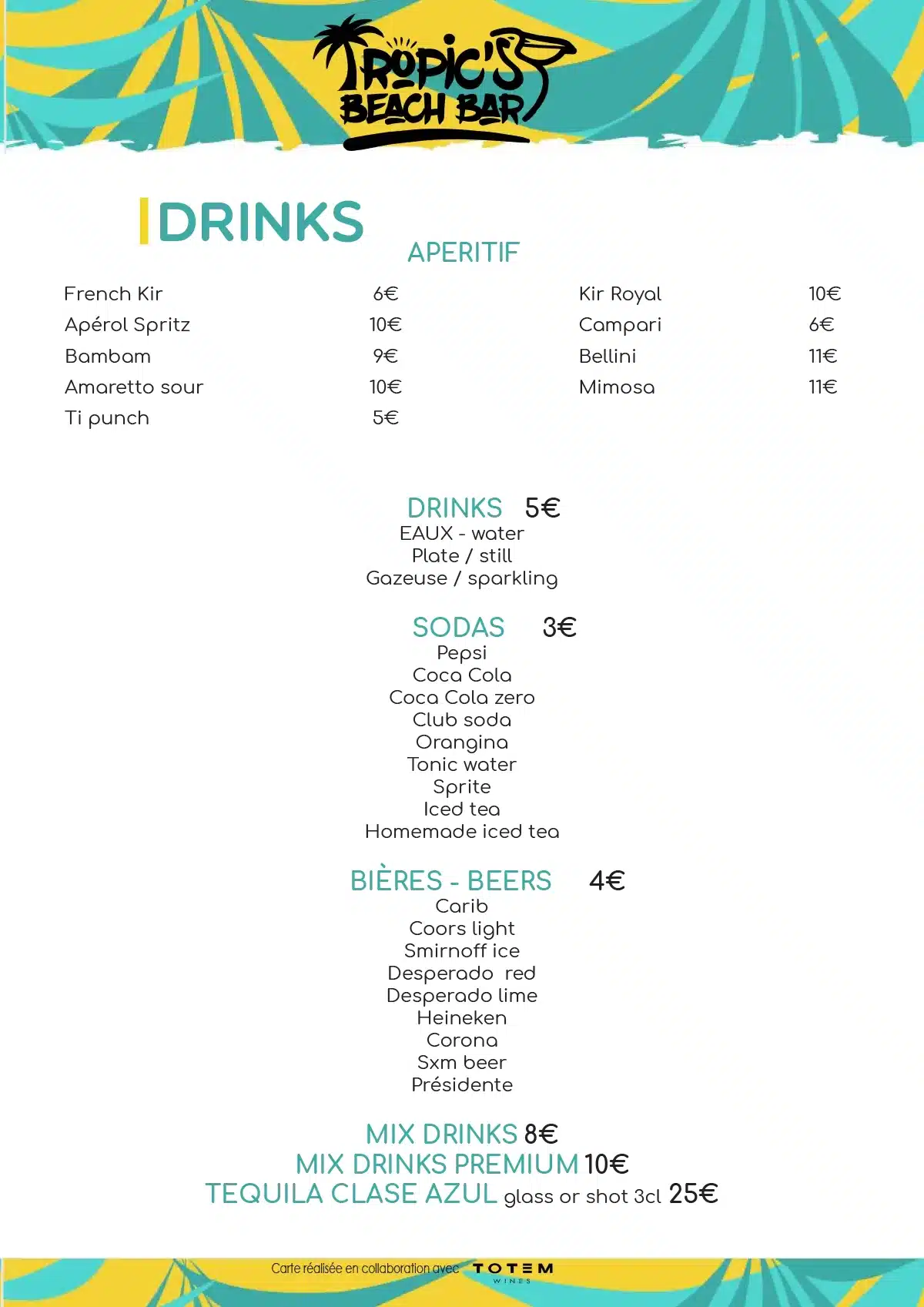 Drinks menu at Tropics in St. Martin showing aperitifs, beers, sodas, and premium mix drinks.