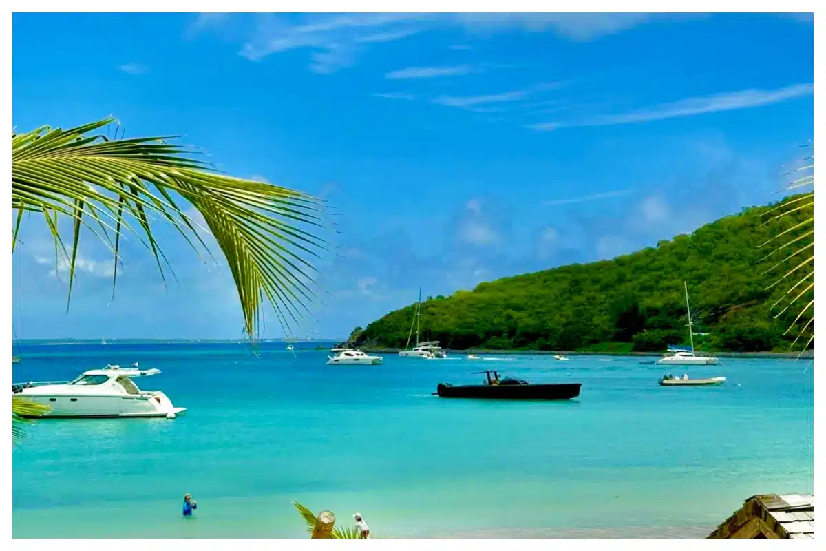 Panoramic view of Anse Marcel Beach, St. Martin—pristine white sand and turquoise waters.