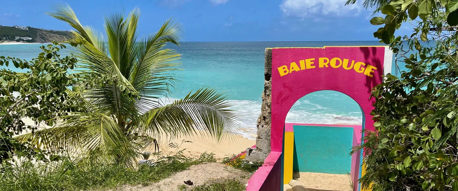 Baie Rouge Beach, St. Martin: Secluded pink sand shoreline with turquoise waters.