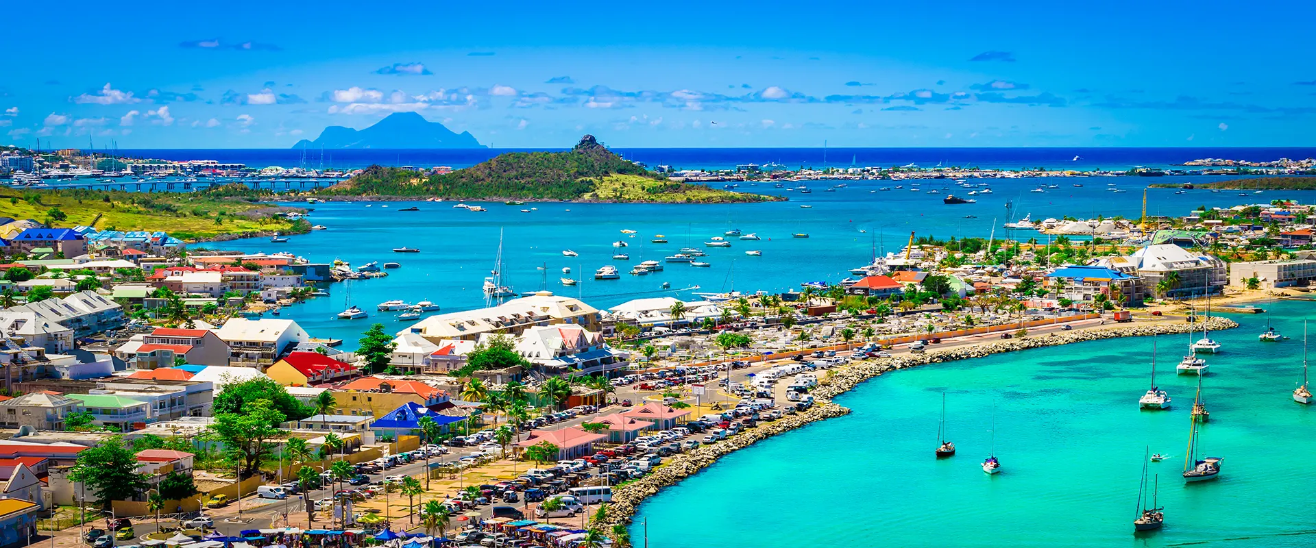 Panoramic view of Marigot, the vibrant capital of the French side of Saint Martin, showcasing its colorful architecture and bustling harbor.