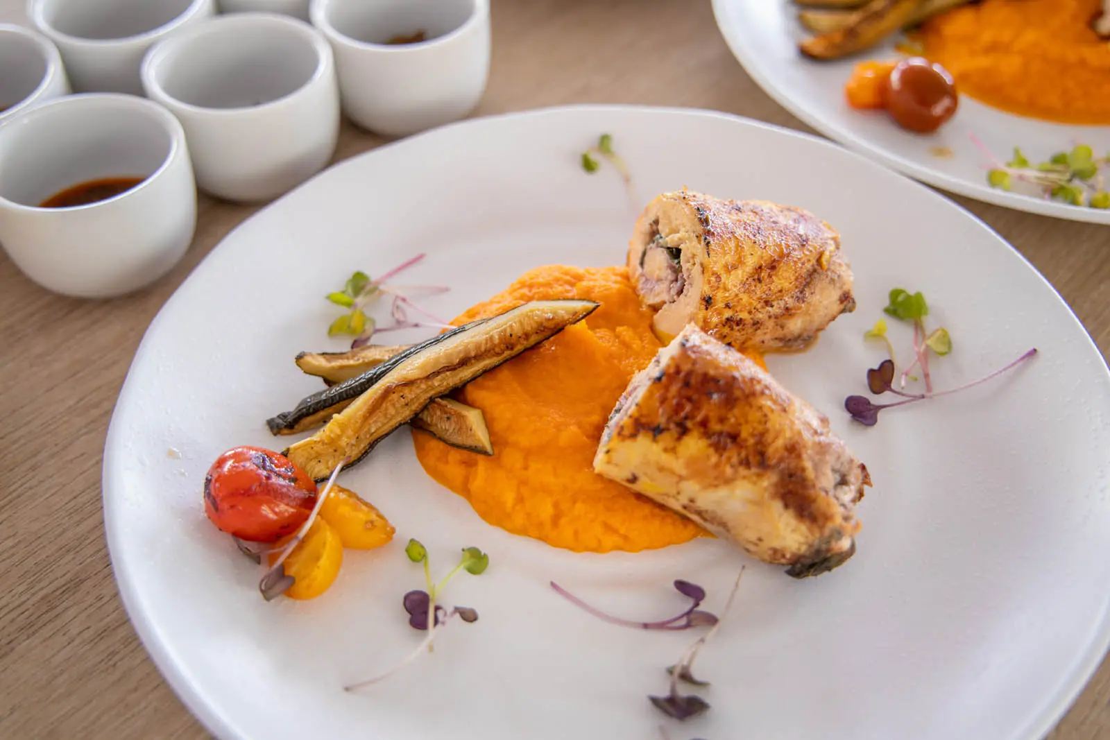 Lagoon 450S power catamaran 'Galaxy' equipped with paddle boards, kayak, floating mat, and snorkeling gear in turquoise waters.