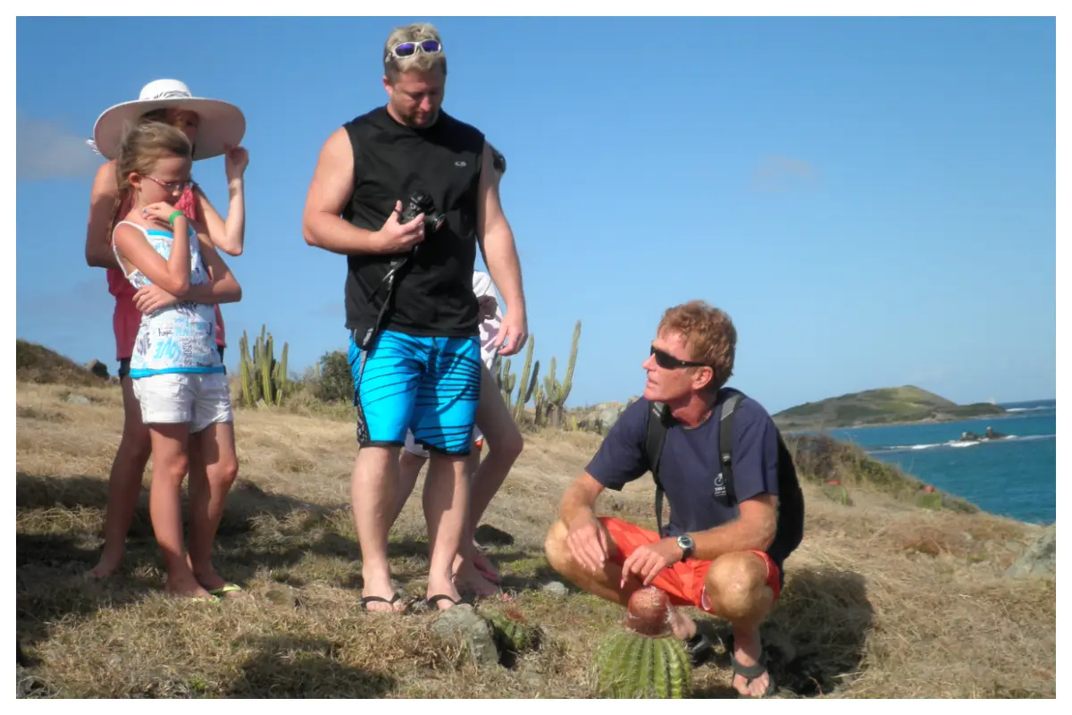Hiking through Guana Bay's rugged coastline, passing natural pools and scenic vistas